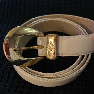 Ivory LeatherBelt with gold buckle. This is new and fits waist 36-40inches